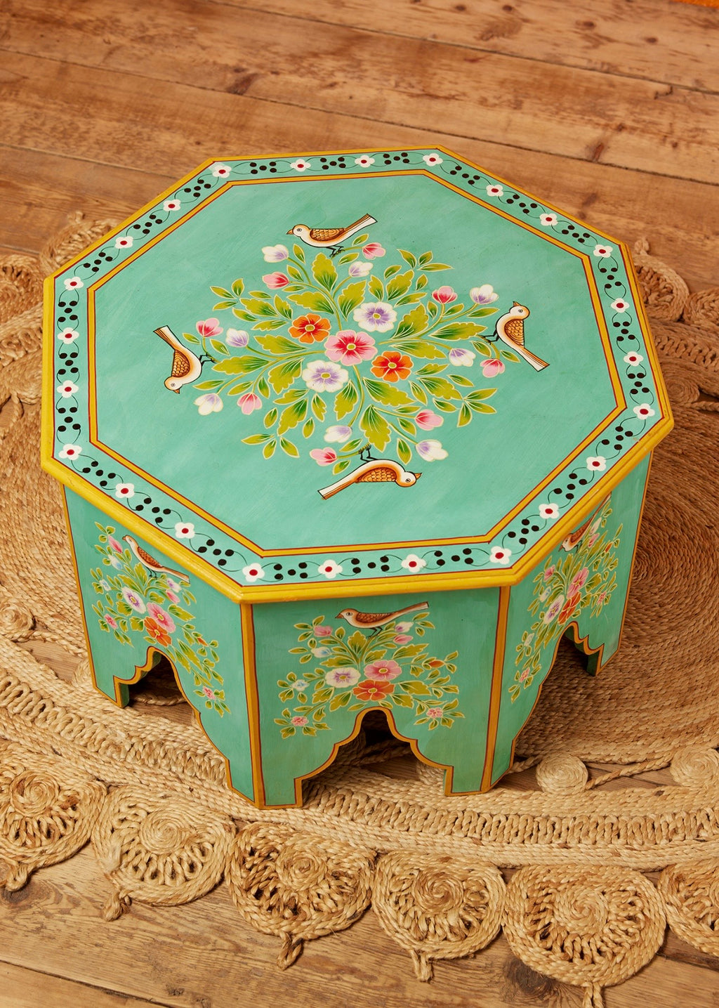 Top view of The Gulshan turquoise octagonal coffee table with hand-painted flowers and birds