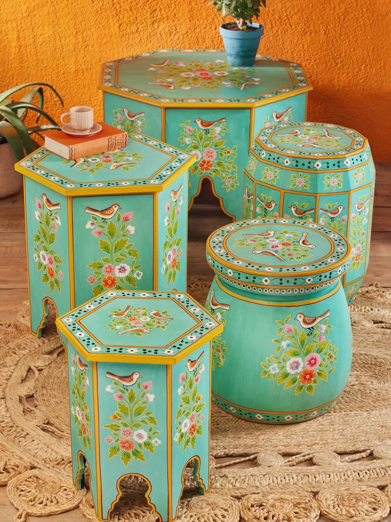 Hand-painted turquoise bird and floral furniture collection styled together