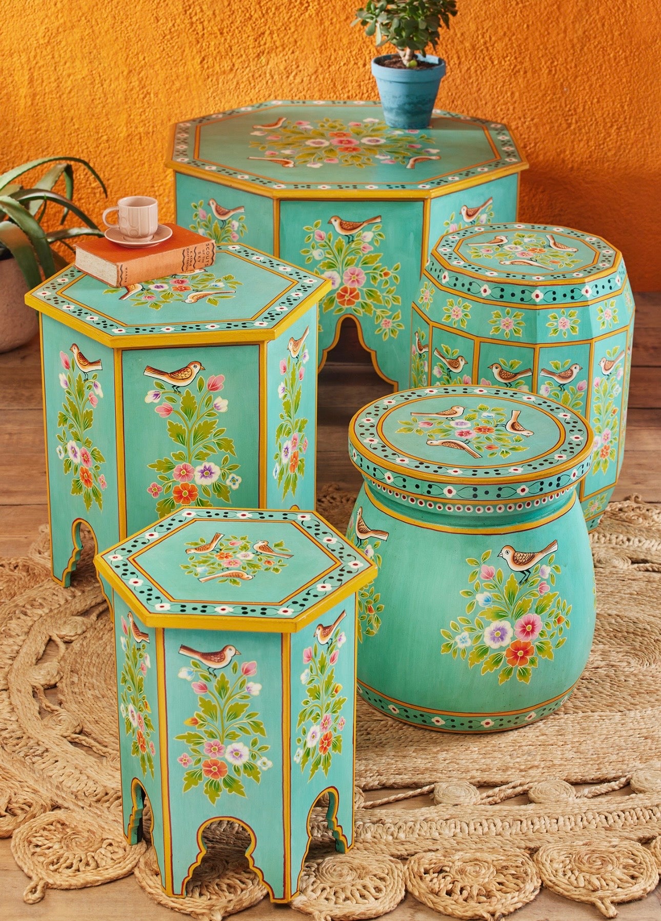 The Bulbul Accent Table styled with matching hand-painted turquoise artisan furniture